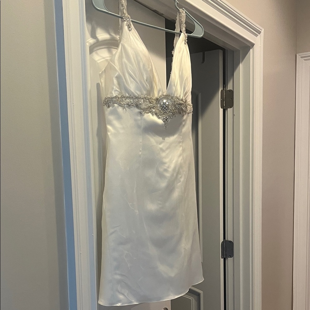 Elegant White Satin Wedding Dress with Silver Embellishments